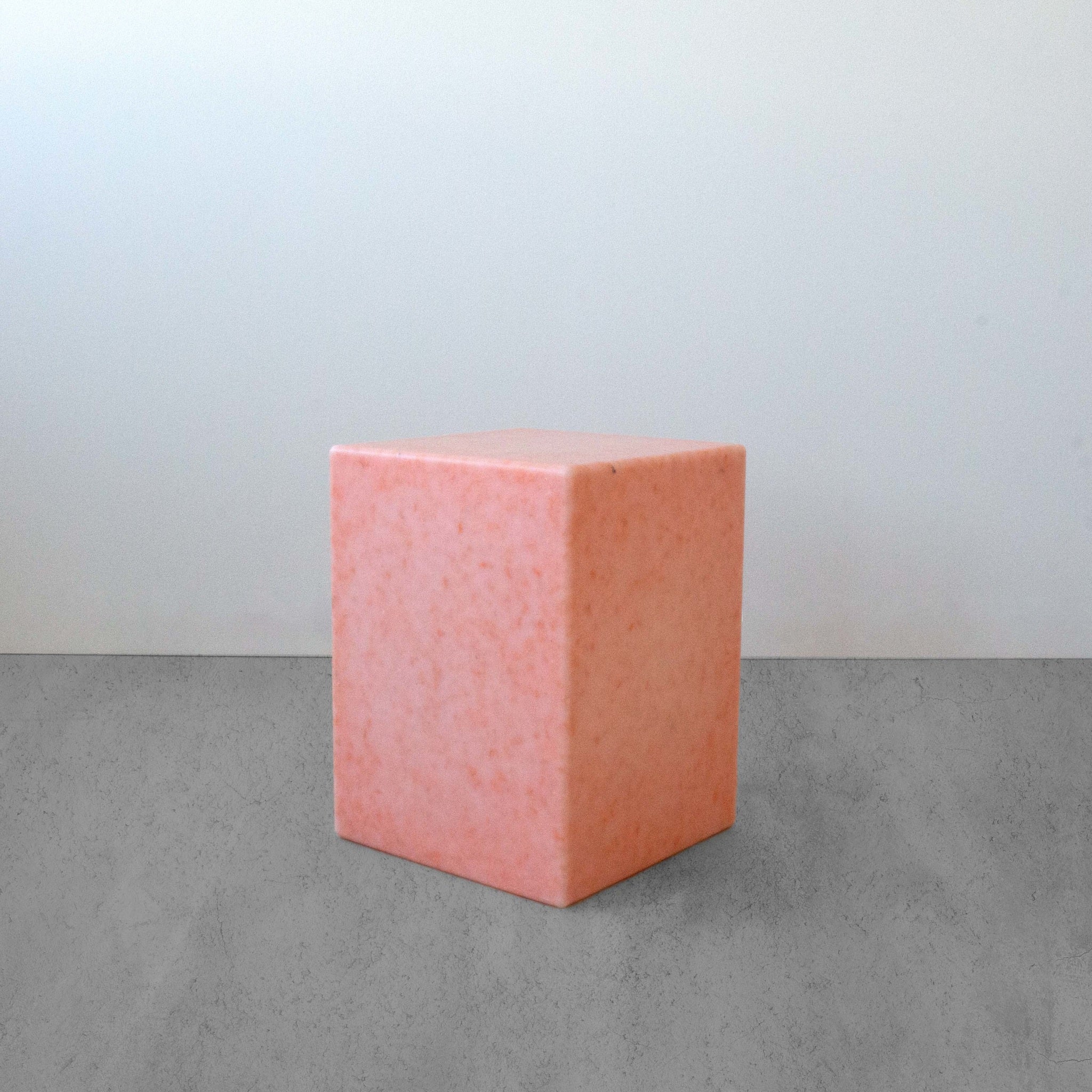Sigrid42 podium in pink, Danish cubic stool and side table by SMALLrevolution, crafted from 100% recycled plastic waste.